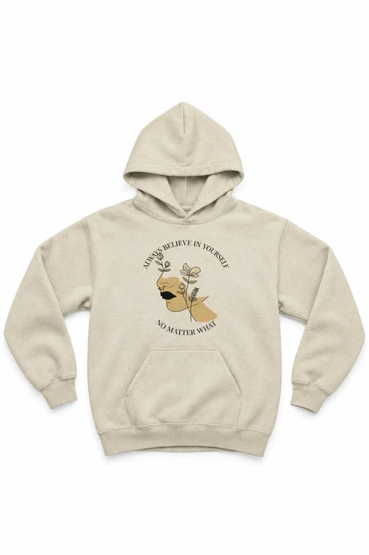 A light beige pullover hoodie with a front graphic of a deer head and the text 'YOU BELIEVE IN YOURSELF' displayed on a solid white background.