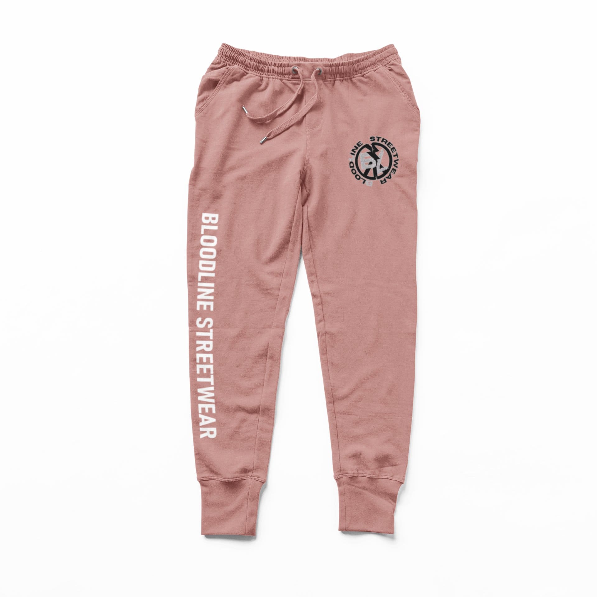 Muave sweatpants with branding on a white background
