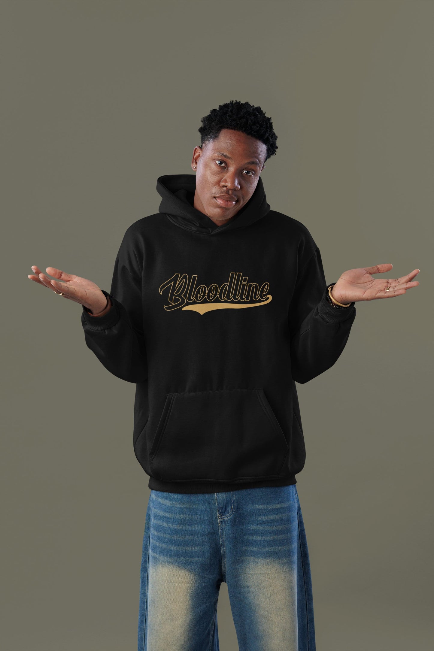 Person wearing a black hoodie with 'Bloodline' text on a gray background