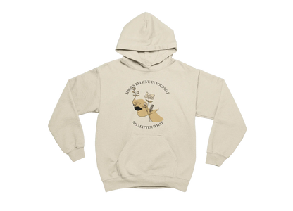 Beige hoodie with a graphic of a dog and motivational quote on a white background