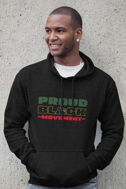 Man wearing a black hoodie with 'Proud Block Movement' text against a concrete wall.