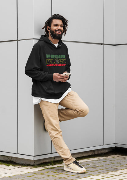 Man wearing a black hoodie with 'Proud Black Movement' text, leaning against a light gray wall.