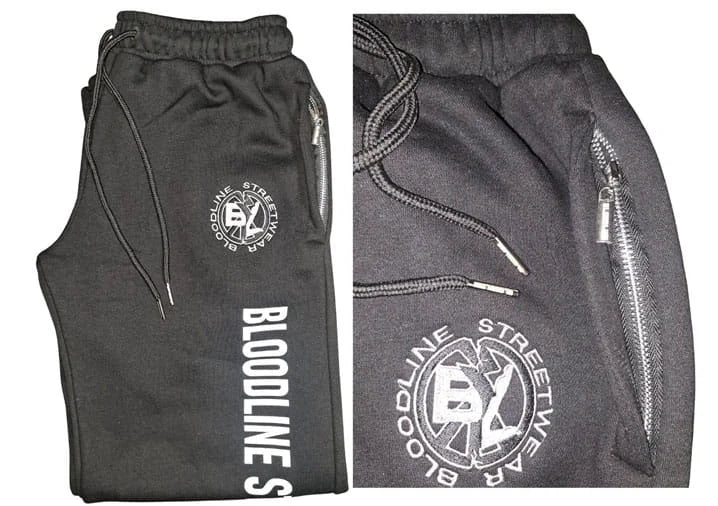 Dark gray sweatpants with 'Bloodline Streetwear' branding on a white background