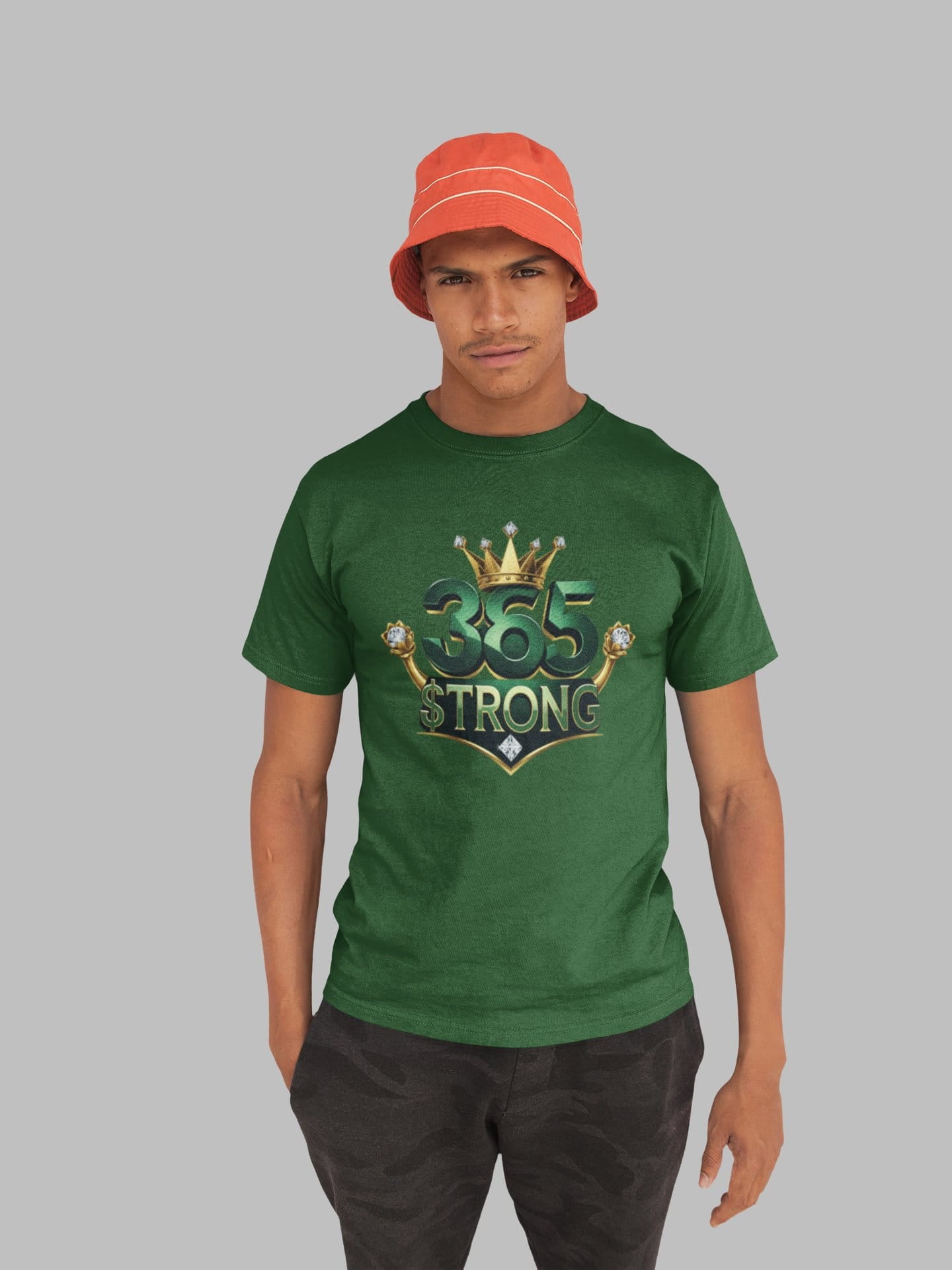 Person wearing a green '365 Strong' t-shirt and red bucket hat on a gray background