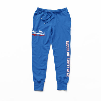 True blue sweatpants with 'Bloodline Street Wear' branding on a white background