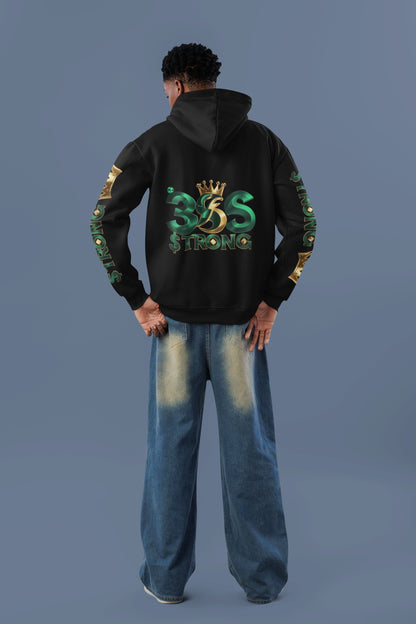 Person wearing a black hoodie with '305 Strong' text and graphics on the back, standing against a gray background.