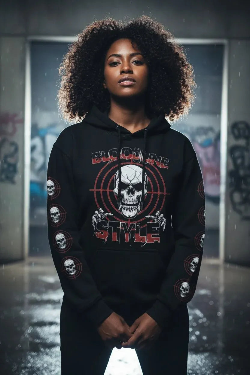 A woman with voluminous dark curly hair stands in a moody, rain-slicked industrial setting wearing a black hoodie with a large skull graphic and the words 'BIG OZONE STYLE' on the front.