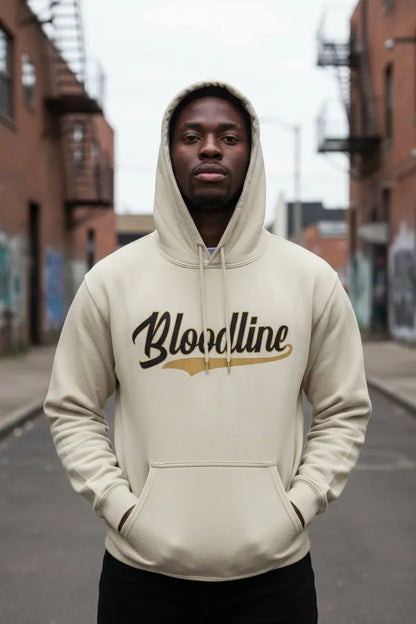 Black male model wearing Bloodline Streetwear Vanilla Drip Signature Hoodie in sand