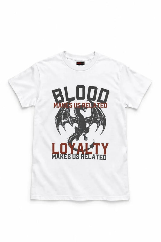 A white short-sleeve crewneck t-shirt featuring a graphic print of a black dragon with the text 'BLOOD MAKES US RELATED' and 'LOYALTY MAKES US RELATED' in black and red lettering.
