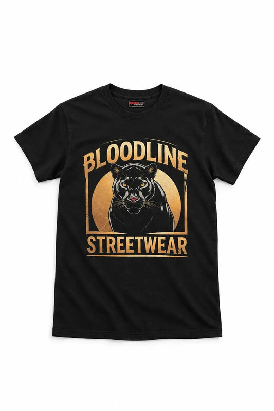 A black short-sleeve crewneck t-shirt featuring a large graphic print on the front with a black panther illustration and the text 'BLOODLINE STREETWEAR' in gold and orange.
