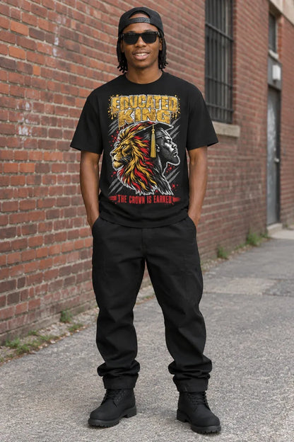Black Educated King T-shirt back graphic with crown and the words From the Struggle Came the Scholar. man standing