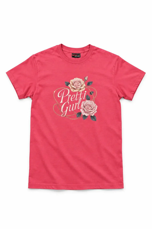 A pink short-sleeve crewneck t-shirt featuring a graphic on the front with two pink roses and the text 'Pretti Girls' in white script.