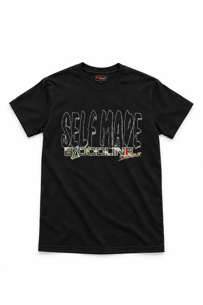 A black short-sleeve crewneck t-shirt featuring a graphic print on the front with the text 'SELF-MAZE' in a stylized outline font, and 'CYCLING' in a camouflage pattern with a small red and yellow logo underneath, displayed against a plain white background.